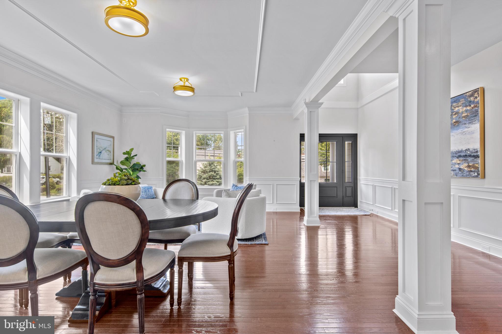 444 Conestoga Road Wayne, PA 19087 - Photo 14 of 82 a view of a dining room with furniture window and wooden floor