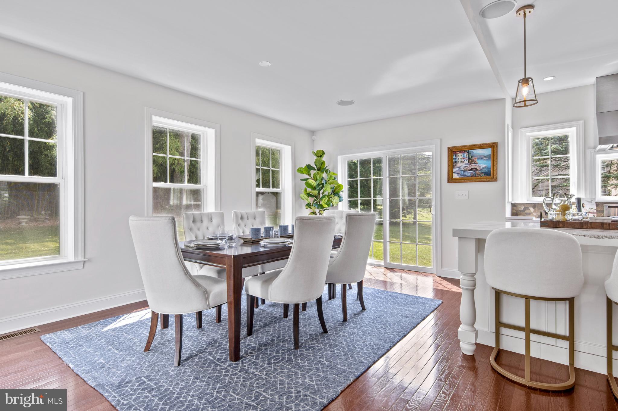 444 Conestoga Road Wayne, PA 19087 - Photo 29 of 82 a view of a dining room with furniture window and wooden floor