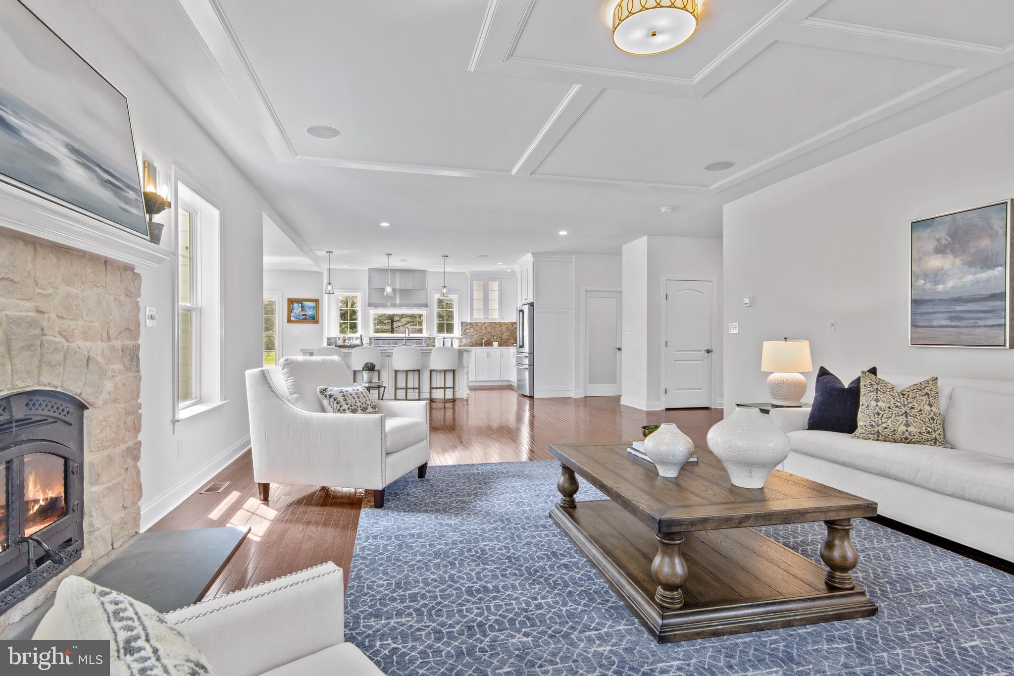 444 Conestoga Road Wayne, PA 19087 - Photo 36 of 82 a living room with furniture and a fireplace