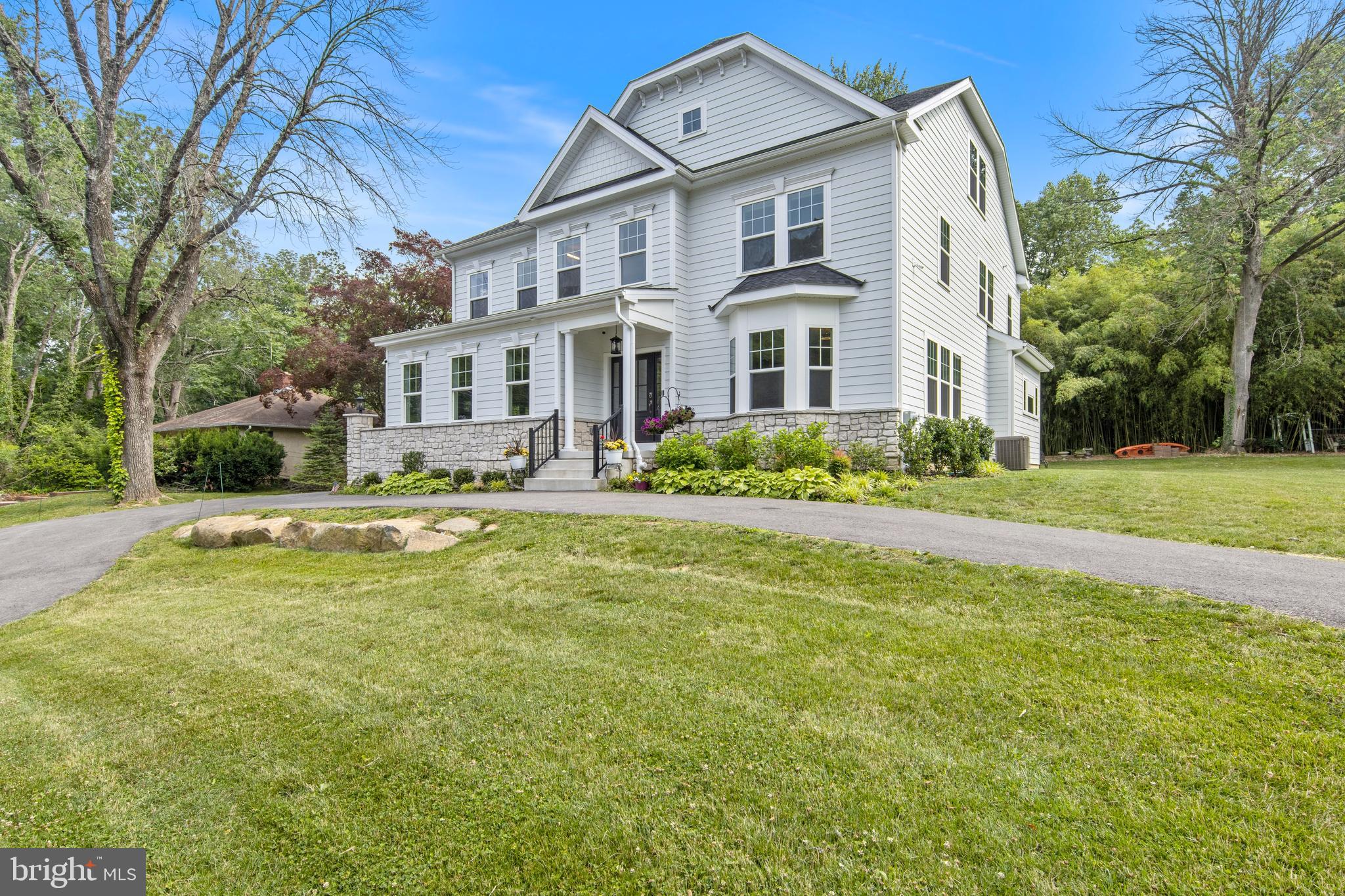 444 Conestoga Road Wayne, PA 19087 - Photo 70 of 82 a front view of a house with a yard