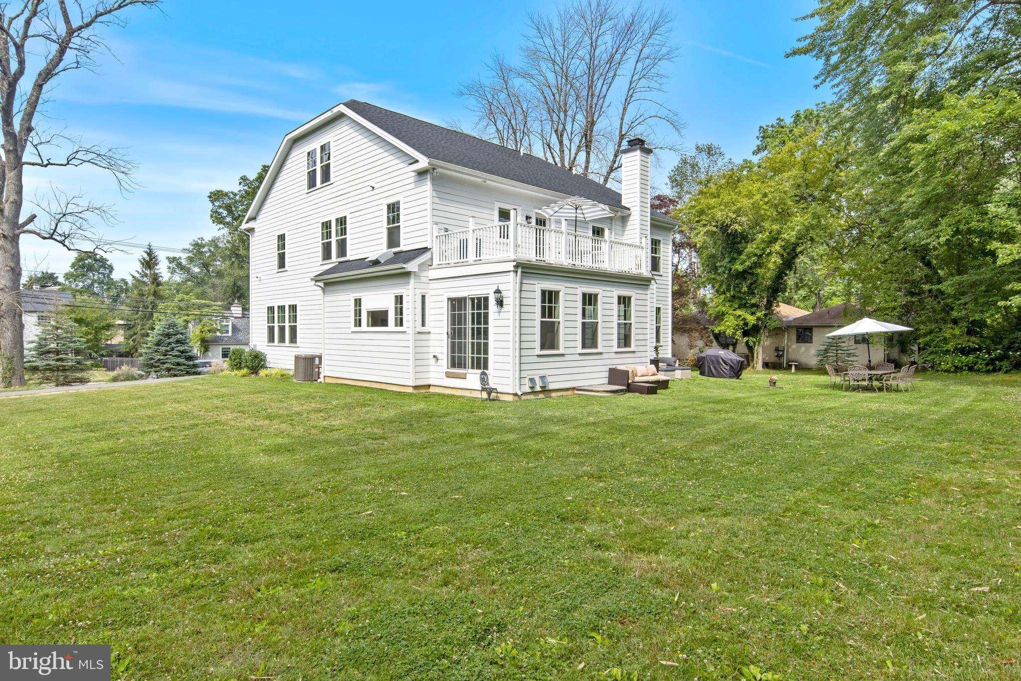 444 Conestoga Road Wayne, PA 19087 - Photo 74 of 82 a front view of a house with a garden
