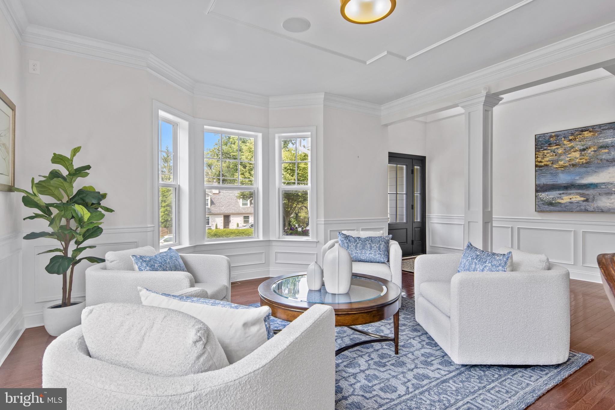 444 Conestoga Road Wayne, PA 19087 - Photo 8 of 82 a living room with furniture and a potted plant