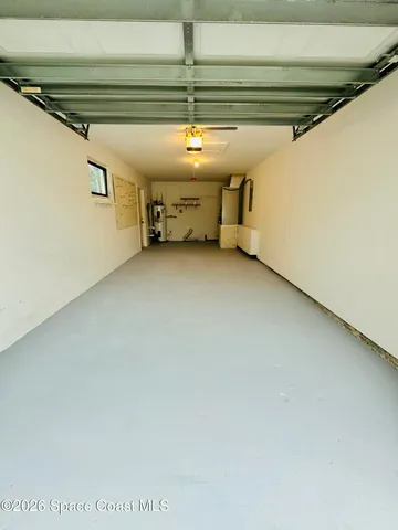 a view of a backyard with a garden and plants