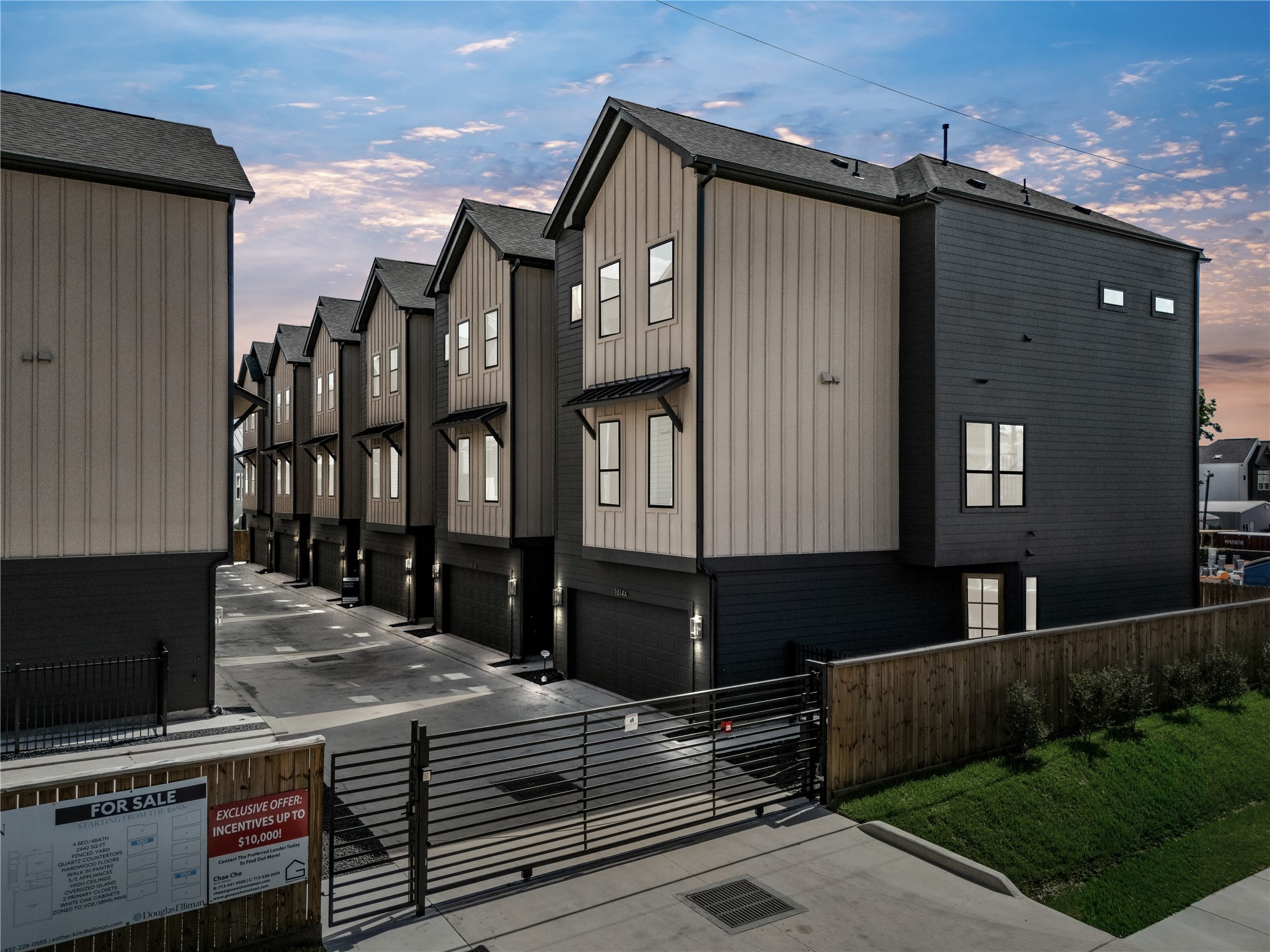 1614 Ojeman Road, Unit J Houston, TX 77055 - Photo 2 of 50 Modern three-story single family homes with a sleek design, featuring two-tone exteriors and attached garages. The homes are situated along a clean, paved driveway, with a fenced area providing added privacy.