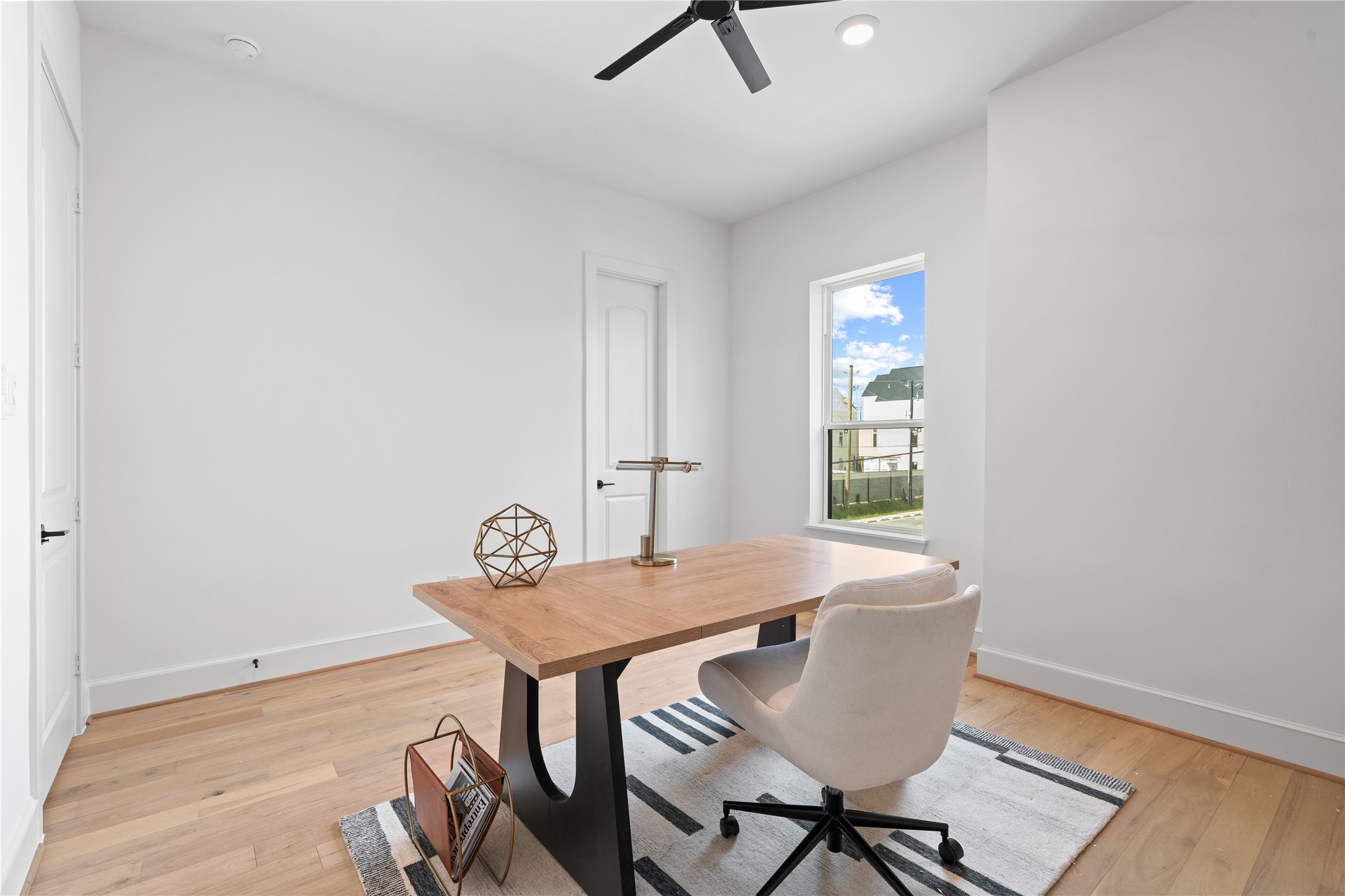 1614 Ojeman Road, Unit J Houston, TX 77055 - Photo 27 of 50 This versatile second-floor bedroom includes a full walk-in closet, offering ample storage and flexibility for use as a office, or media space.