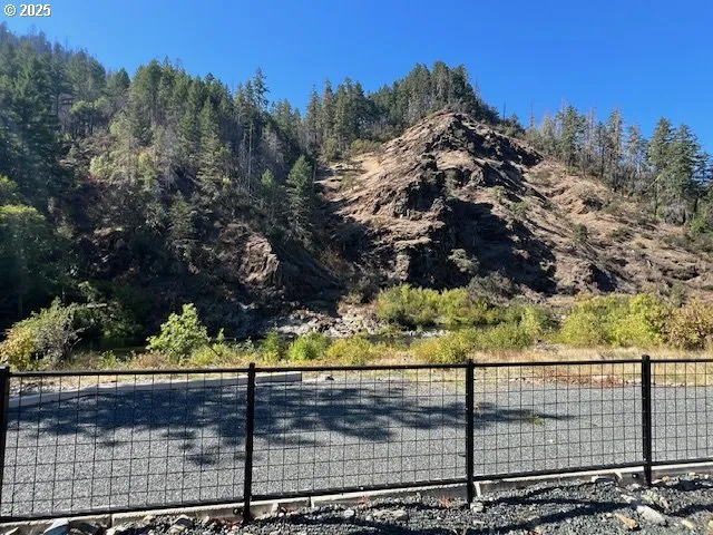 a view of a yard and a mountain view