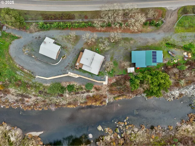 a view of a town with mountains in the background