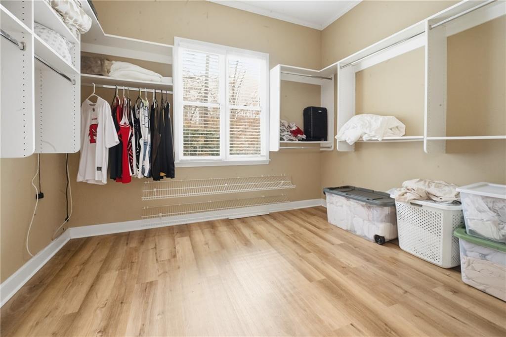 4670 Hamden Forest Drive Southwest Atlanta, GA 30331 - Photo 22 of 68 a view of walk in closet with clothes and shoes