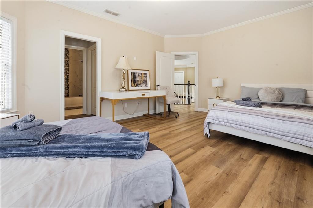 4670 Hamden Forest Drive Southwest Atlanta, GA 30331 - Photo 28 of 68 a living room with a bed furniture and a window