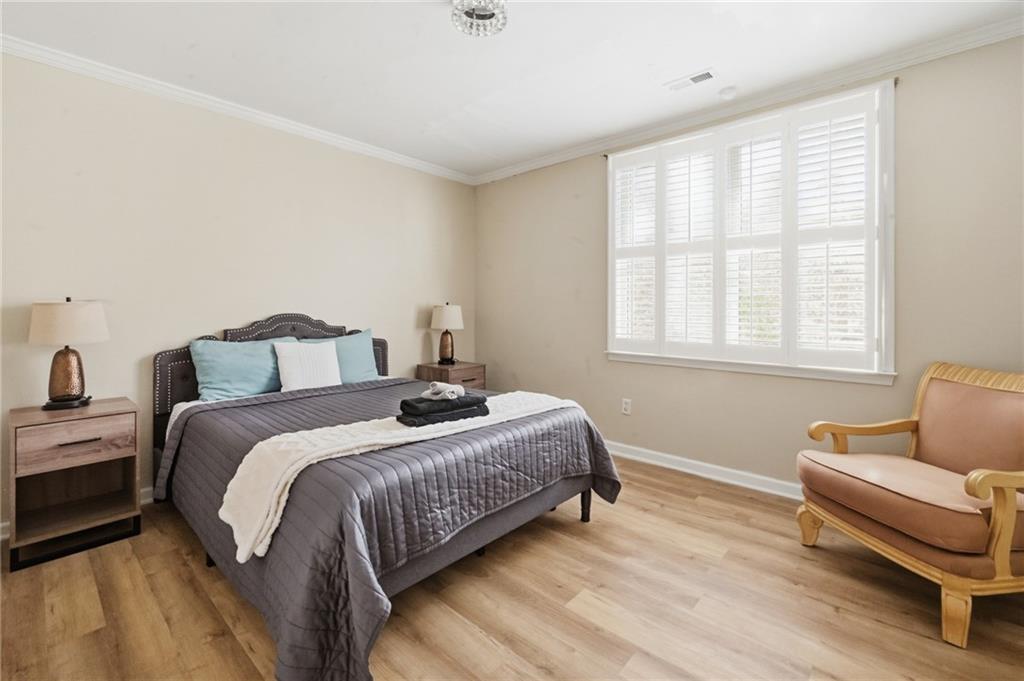 4670 Hamden Forest Drive Southwest Atlanta, GA 30331 - Photo 42 of 68 a bedroom with a bed and a couch