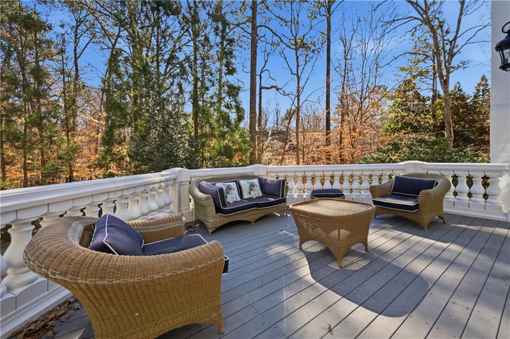 4670 Hamden Forest Drive Southwest Atlanta, GA 30331 - Photo 59 of 68 a balcony with wooden floor and furniture