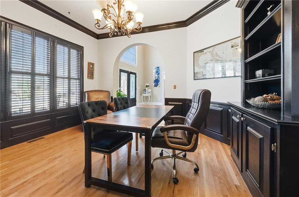 4670 Hamden Forest Drive Southwest Atlanta, GA 30331 - Photo 7 of 68 a view of a dining room with furniture window and wooden floor