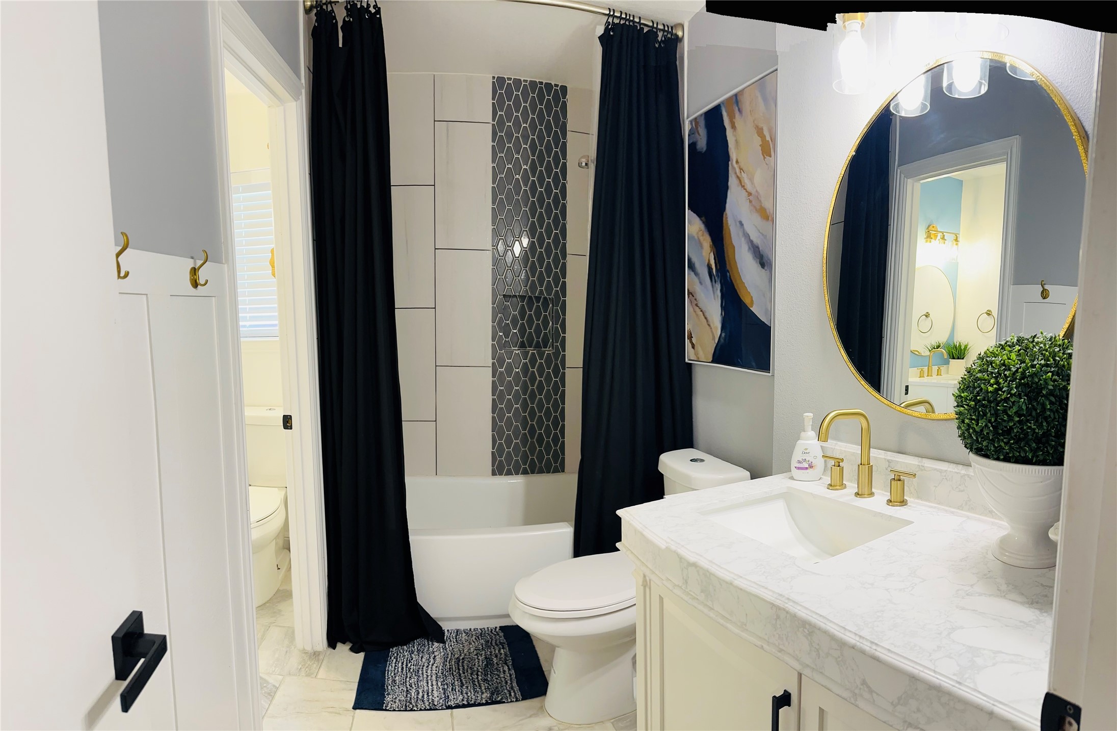 1457 Camellia Street Sweeny, TX 77480 - Photo 16 of 26 a bathroom with a sink a toilet and a mirror