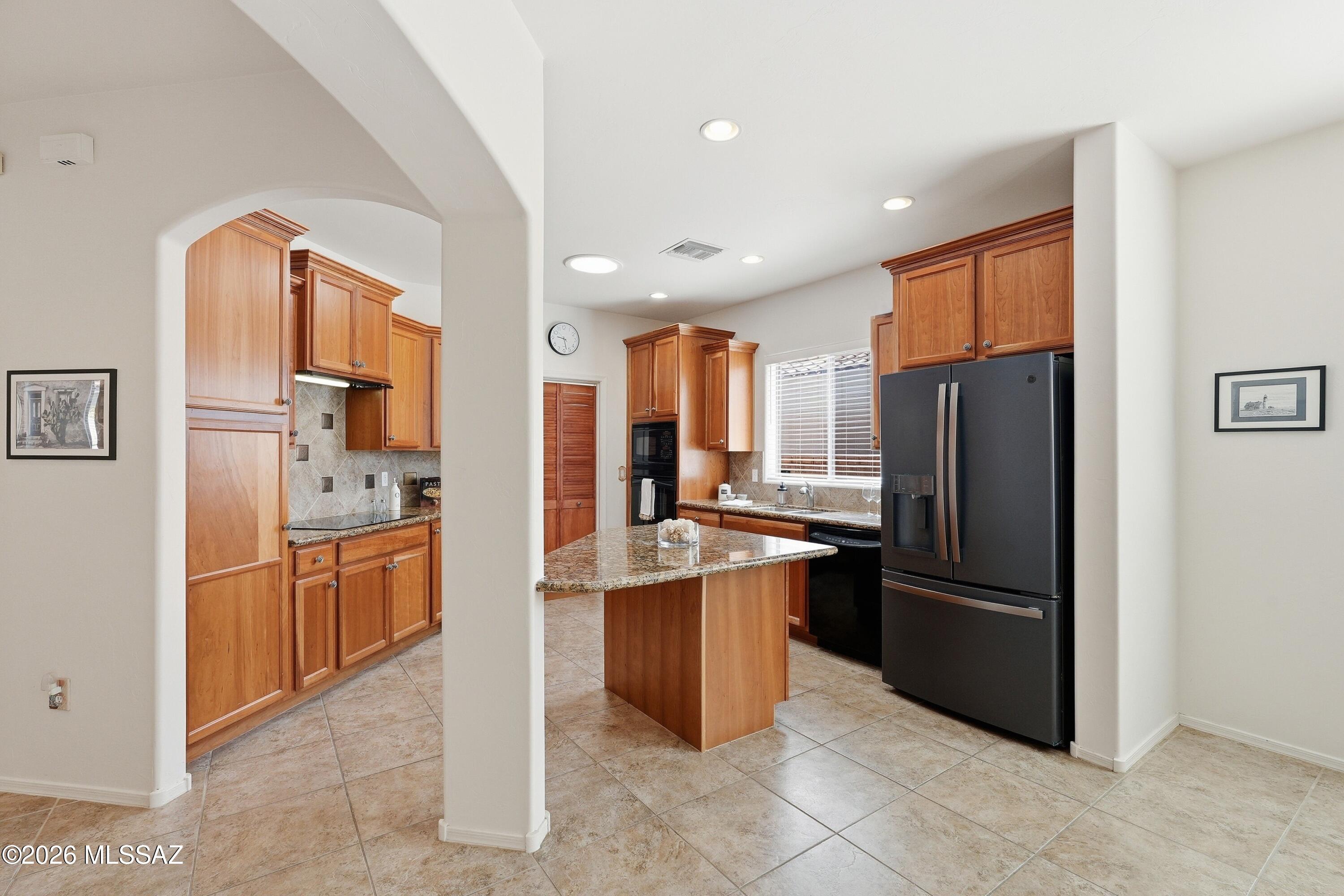 2845 North Vactor Ranch Place Tucson, AZ 85715 - Photo 11 of 41 Kitchen Dining Bar