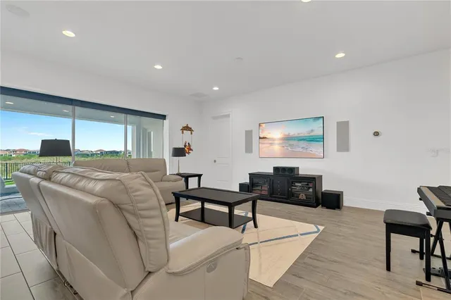 a bathroom with a sink toilet vanity and tub