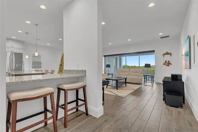 a room with furniture and gym equipment