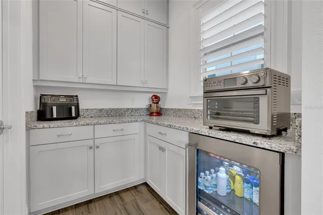 a view of a house with a garden and yard