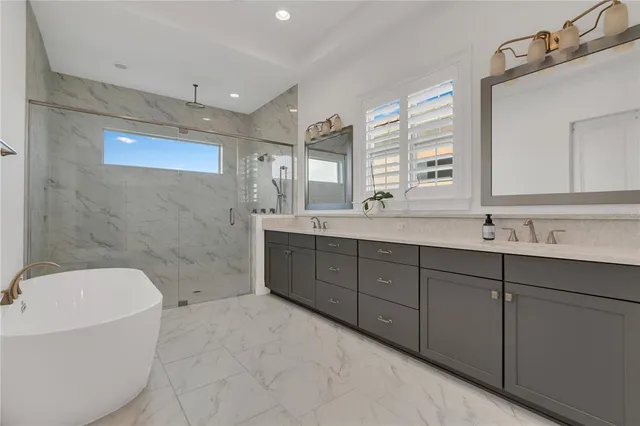 an aerial view of residential building and lake