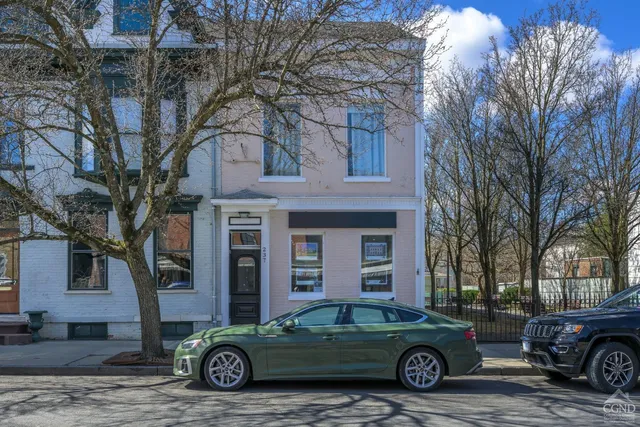 a car parked in front of a house