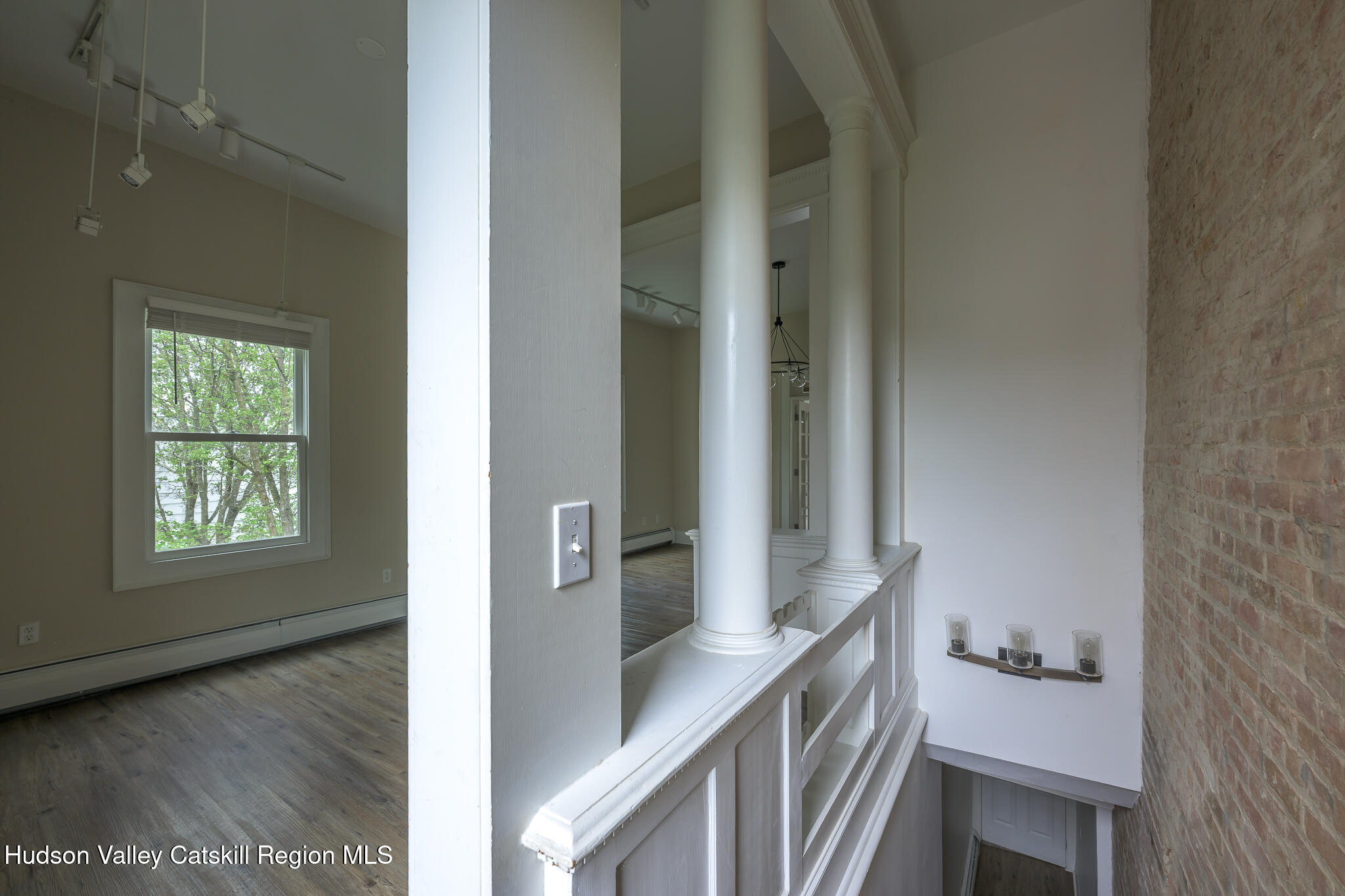 237 Warren Street Hudson, NY 12534 - Photo 13 of 39 a kitchen with a sink and refrigerator
