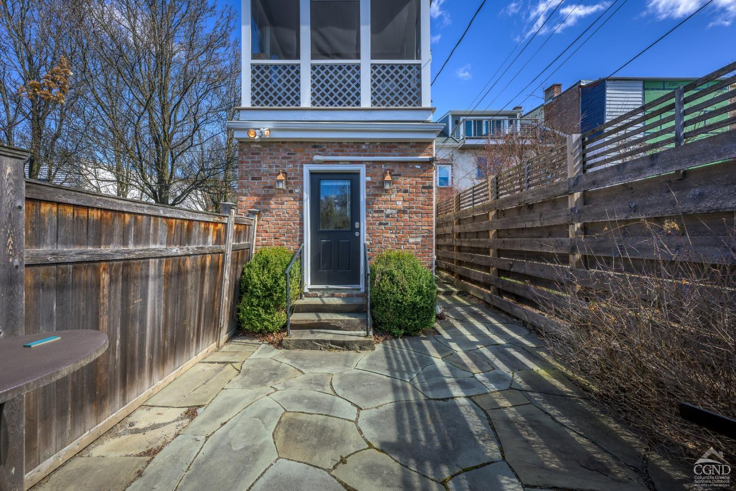 237 Warren Street Hudson, NY 12534 - Photo 36 of 39 a view of a house with a backyard and stairs