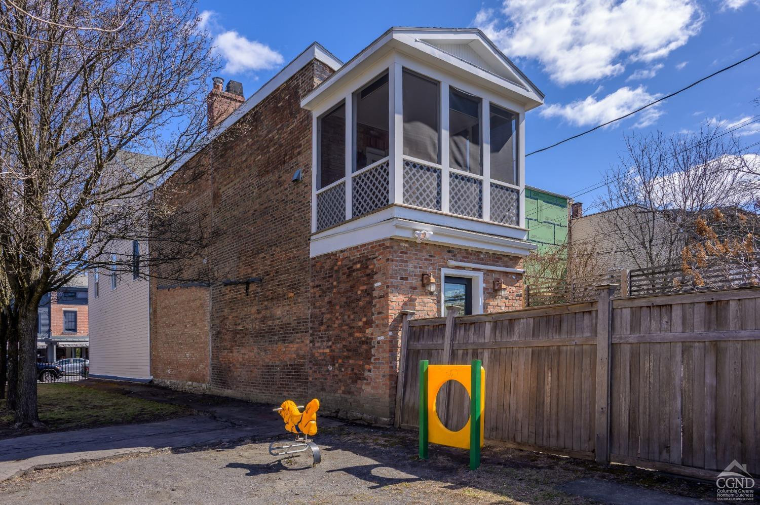 237 Warren Street Hudson, NY 12534 - Photo 37 of 39 a view of a building with a backyard
