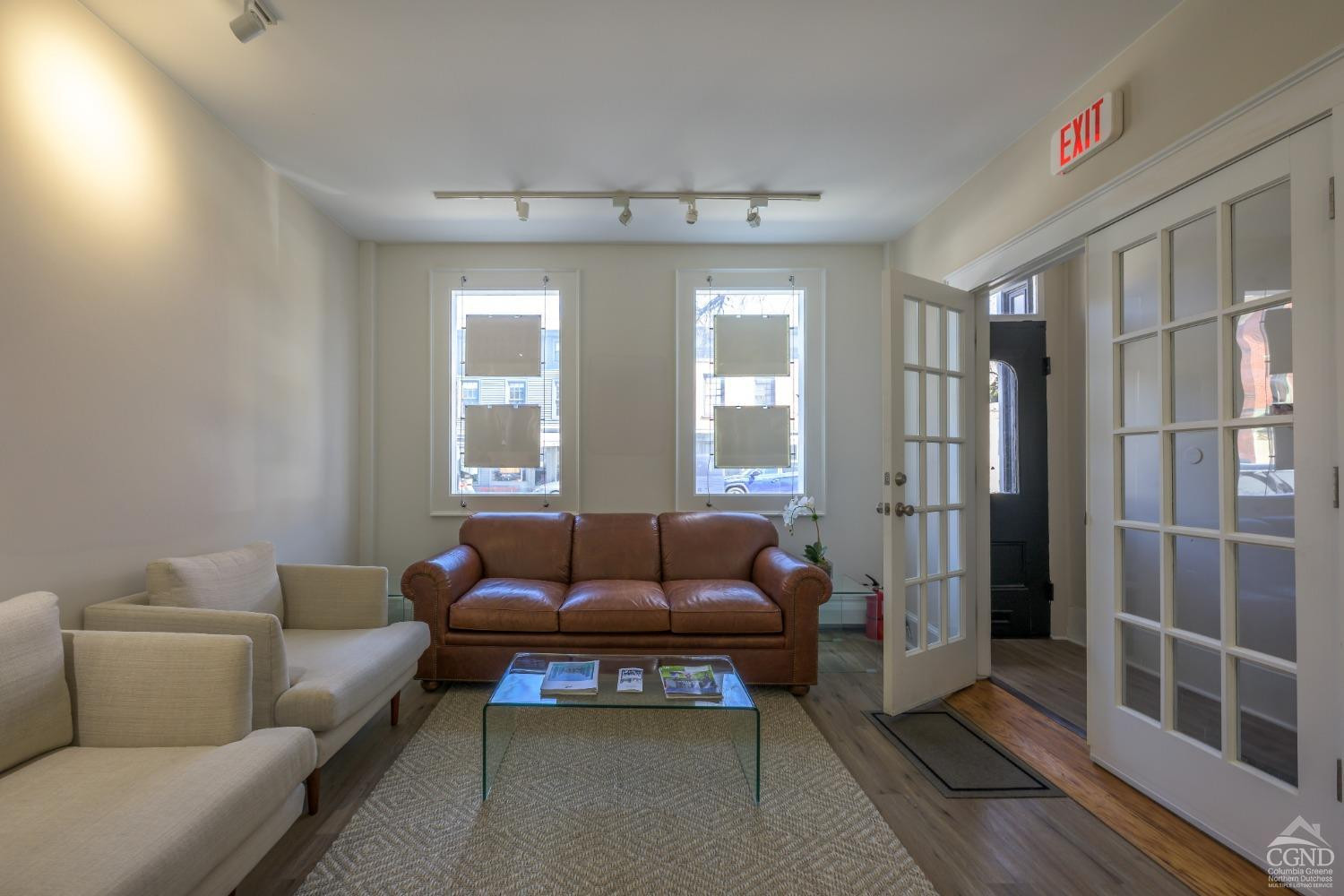 237 Warren Street Hudson, NY 12534 - Photo 4 of 39 a living room with furniture and a window