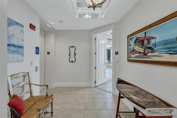 a living room with a couch and a table