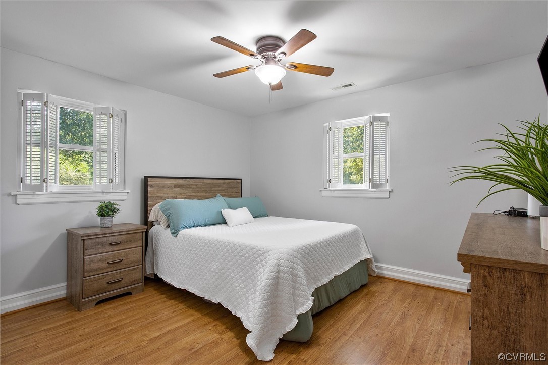 9606 Meadowview Road Henrico, VA 23294 - Photo 11 of 27 a bedroom with a bed and window