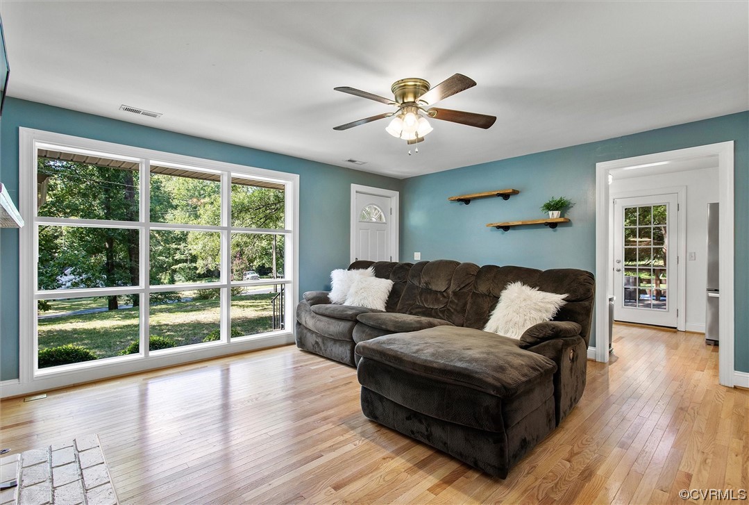 9606 Meadowview Road Henrico, VA 23294 - Photo 2 of 27 a living room with furniture and a large window