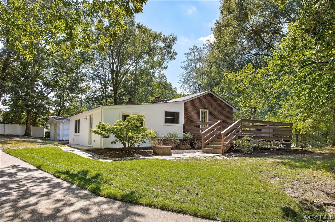 9606 Meadowview Road Henrico, VA 23294 - Photo 22 of 27 a view of a house with backyard