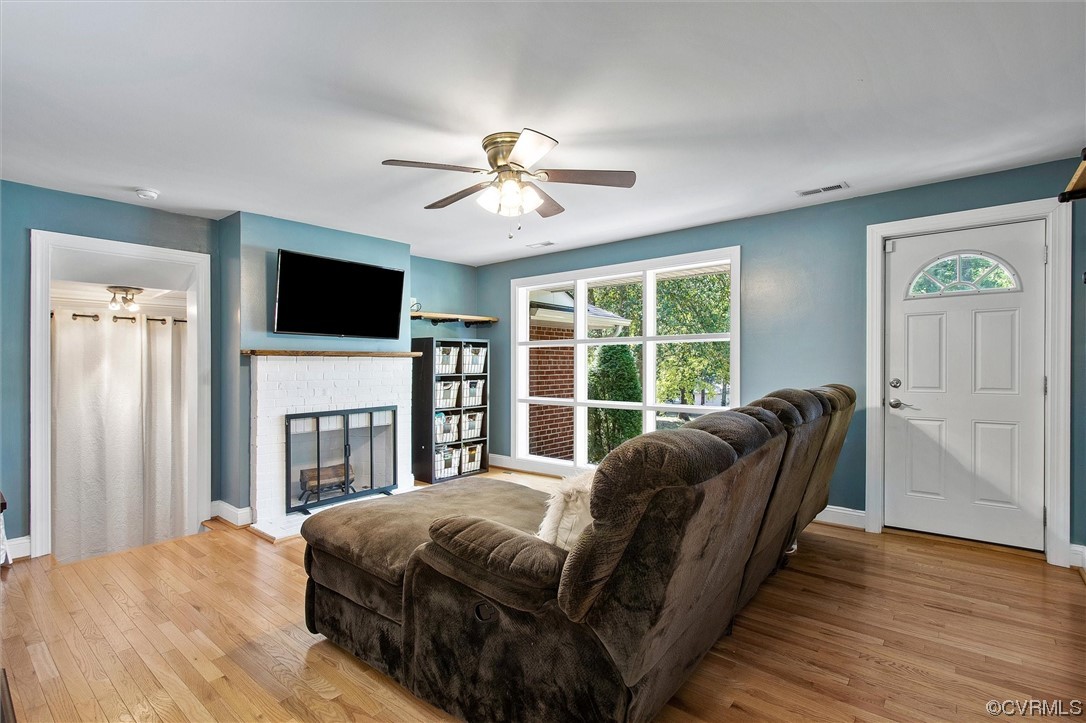 9606 Meadowview Road Henrico, VA 23294 - Photo 5 of 27 a spacious bedroom with a bed and a couch