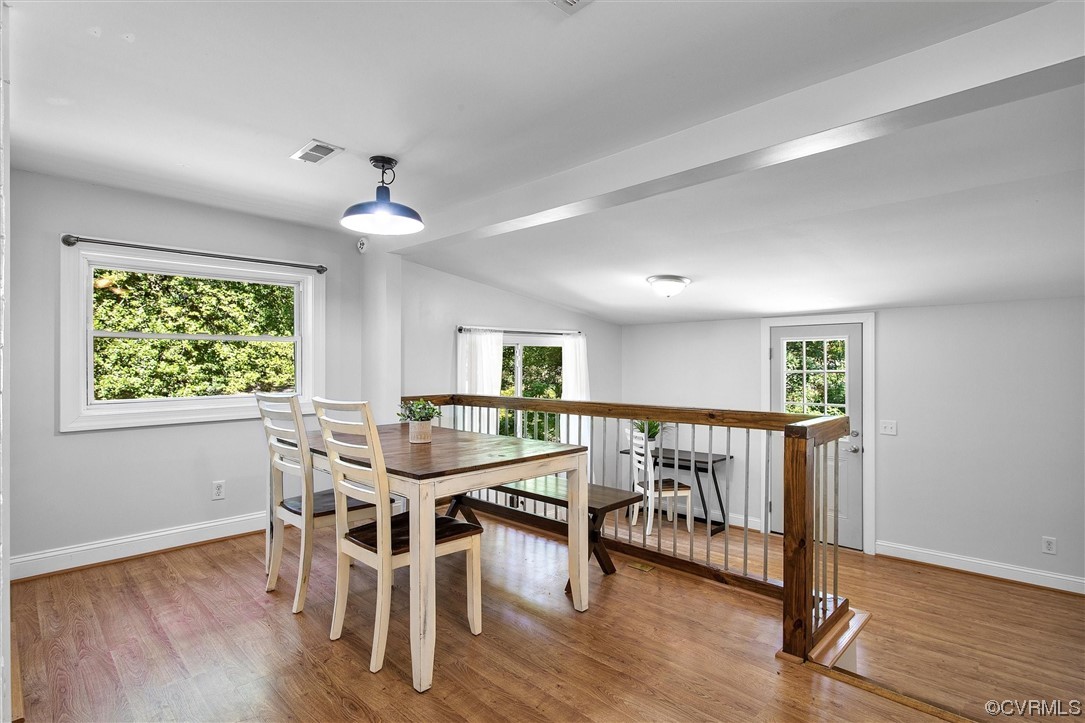 9606 Meadowview Road Henrico, VA 23294 - Photo 6 of 27 a view of a dining room with furniture window and wooden floor