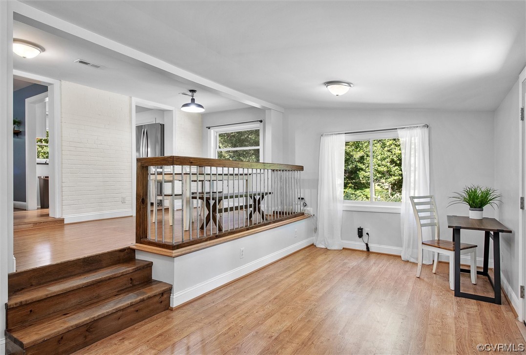 9606 Meadowview Road Henrico, VA 23294 - Photo 7 of 27 a view of staircase with furniture and wooden floor