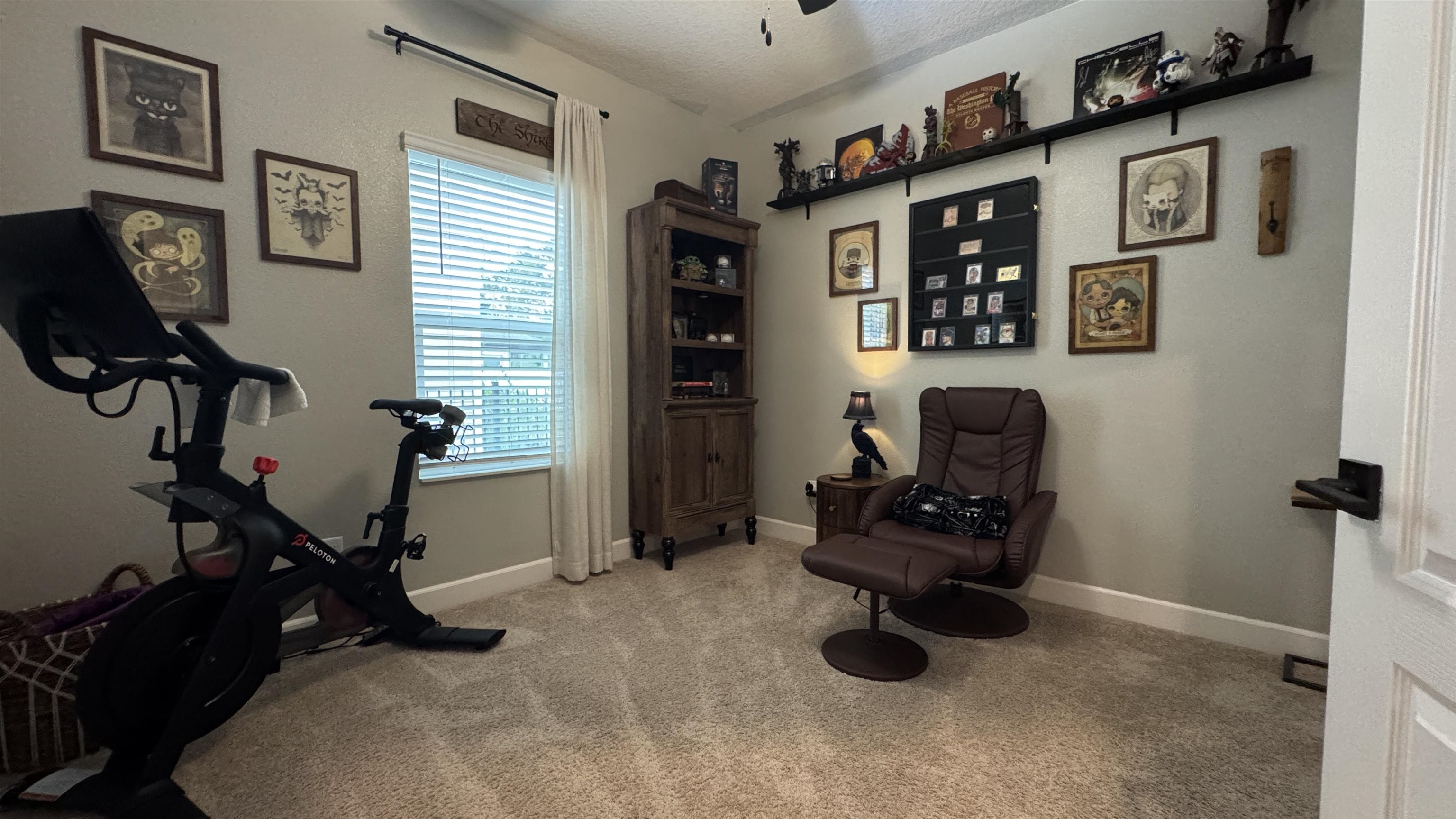 793 Morgans Treasure Road St. Augustine, FL 32084 - Photo 13 of 24 a view of a workspace with furniture and gym equipment