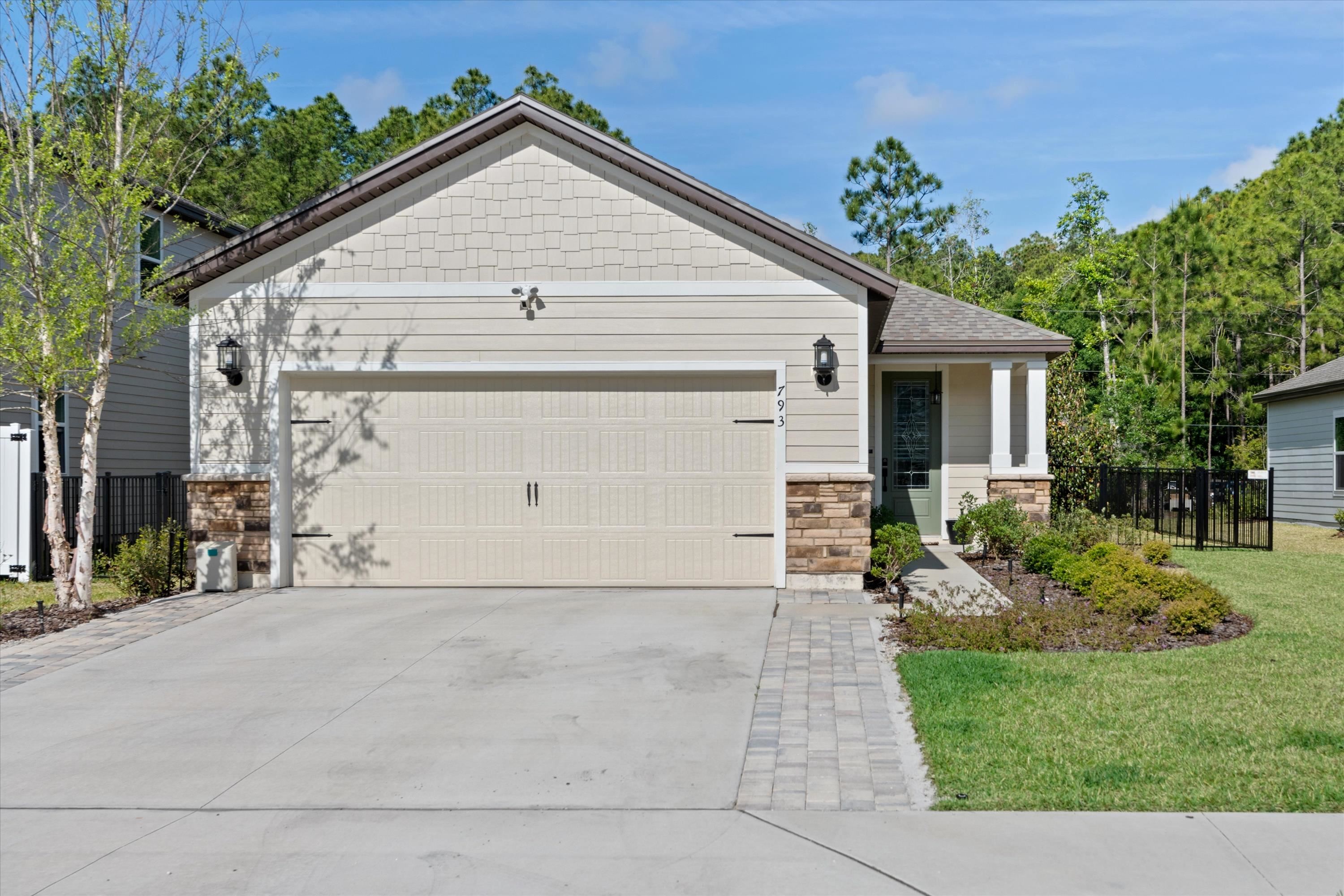 793 Morgans Treasure Road St. Augustine, FL 32084 - Photo 3 of 24 a view of a house with a yard