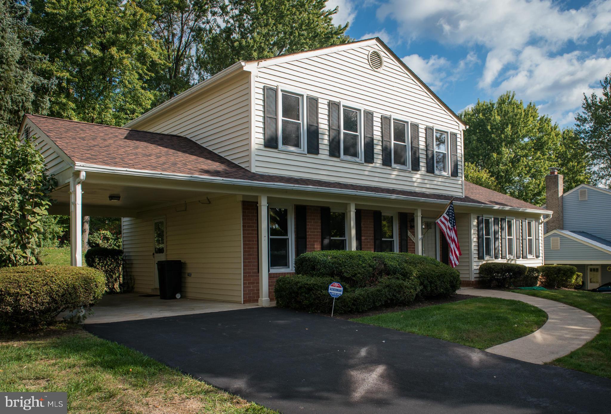 3213 Llewellyn Field Road Olney, MD 20832 - Photo 13 of 30 a front view of a house with a garden