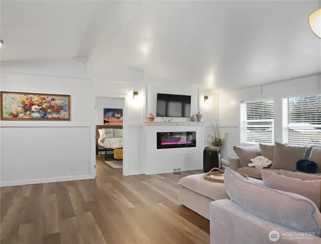 a bathroom with a sink vanity and a mirror