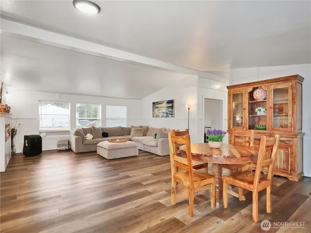 a bathroom with a sink a mirror and a window