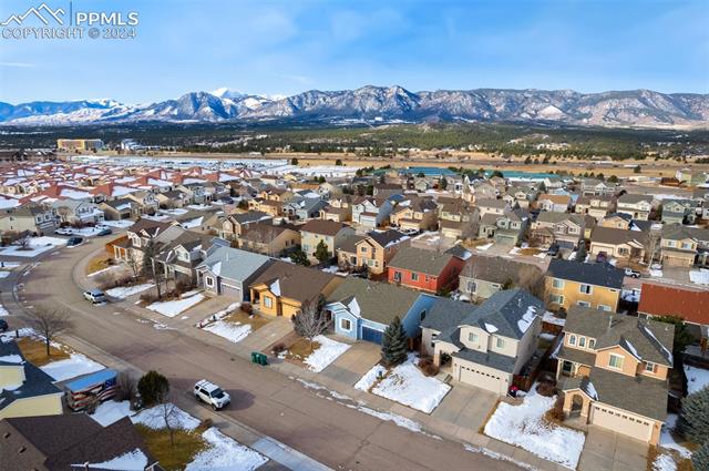 270 Avocet Loop Colorado Springs, CO 80921 - Photo 6 of 11 Snowy aerial view with a mountain view