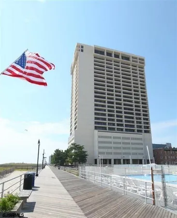 a front view of a building with glass windows