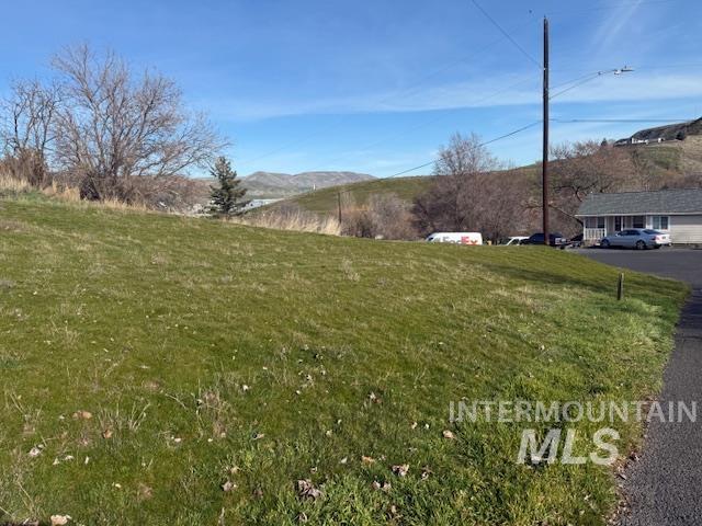 0 Silcott Street Lewiston, ID 83501 - Photo 1 of 9 View of grassy yard with a mountain view