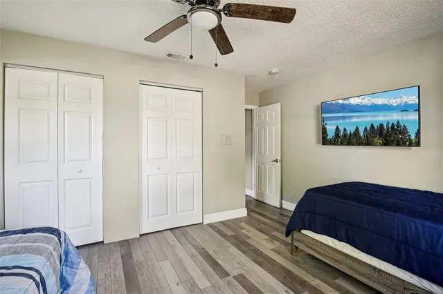 a bathroom with a toilet sink and shower