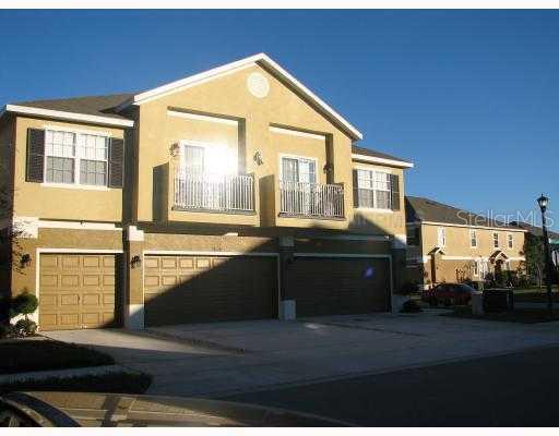 6434 South Goldenrod Road, Unit 17B Orlando, FL 32822 - Photo 1 of 1 a view of a house with a street