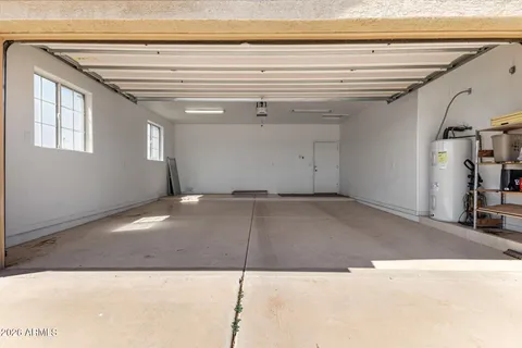 a view of a swimming pool with a bench