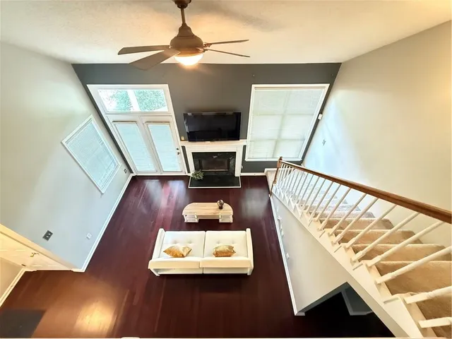 a view of a bathroom with wooden floor