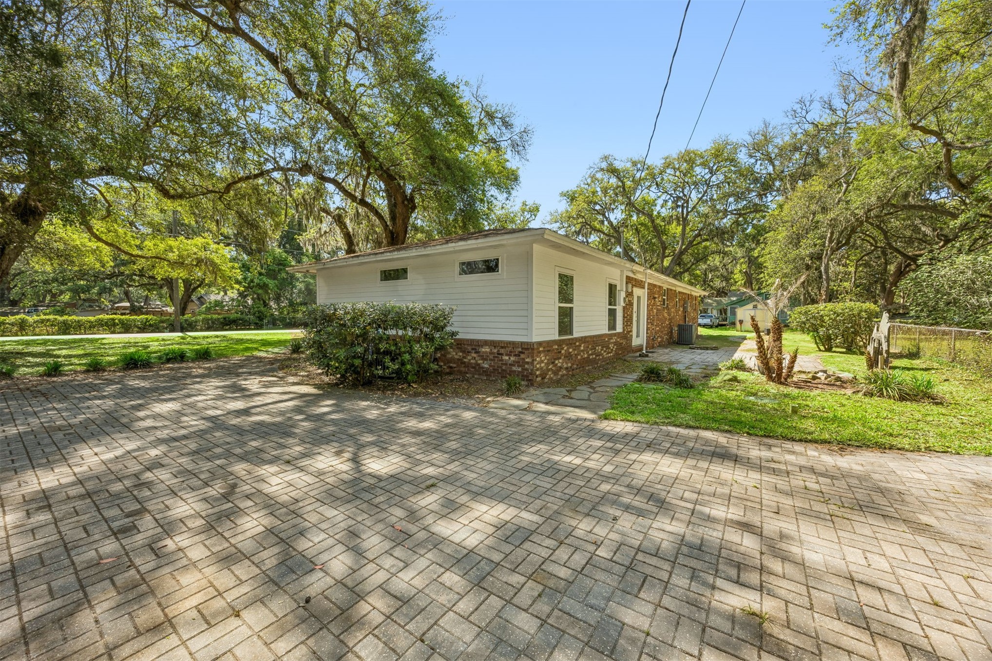 2441 Amelia Road Fernandina Beach, FL 32034 - Photo 32 of 36 a view of a yard in front of a house
