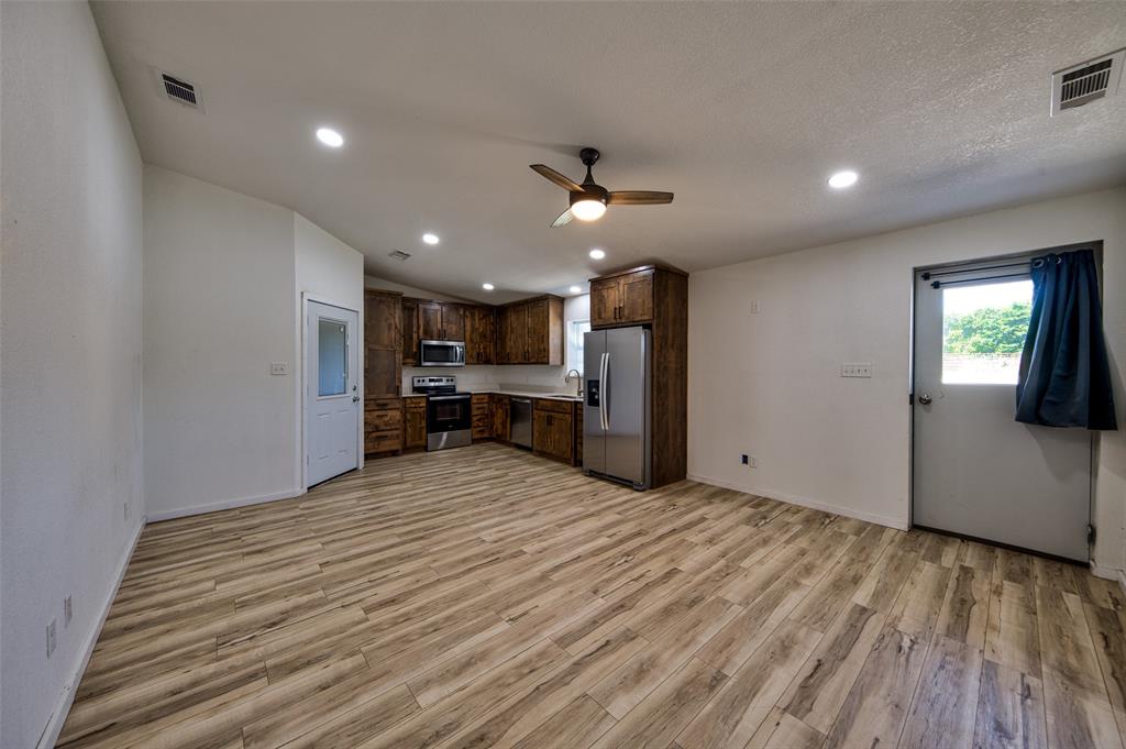 724 Zion Rhome, TX 76078 - Photo 34 of 40 Apartment parking and entrance