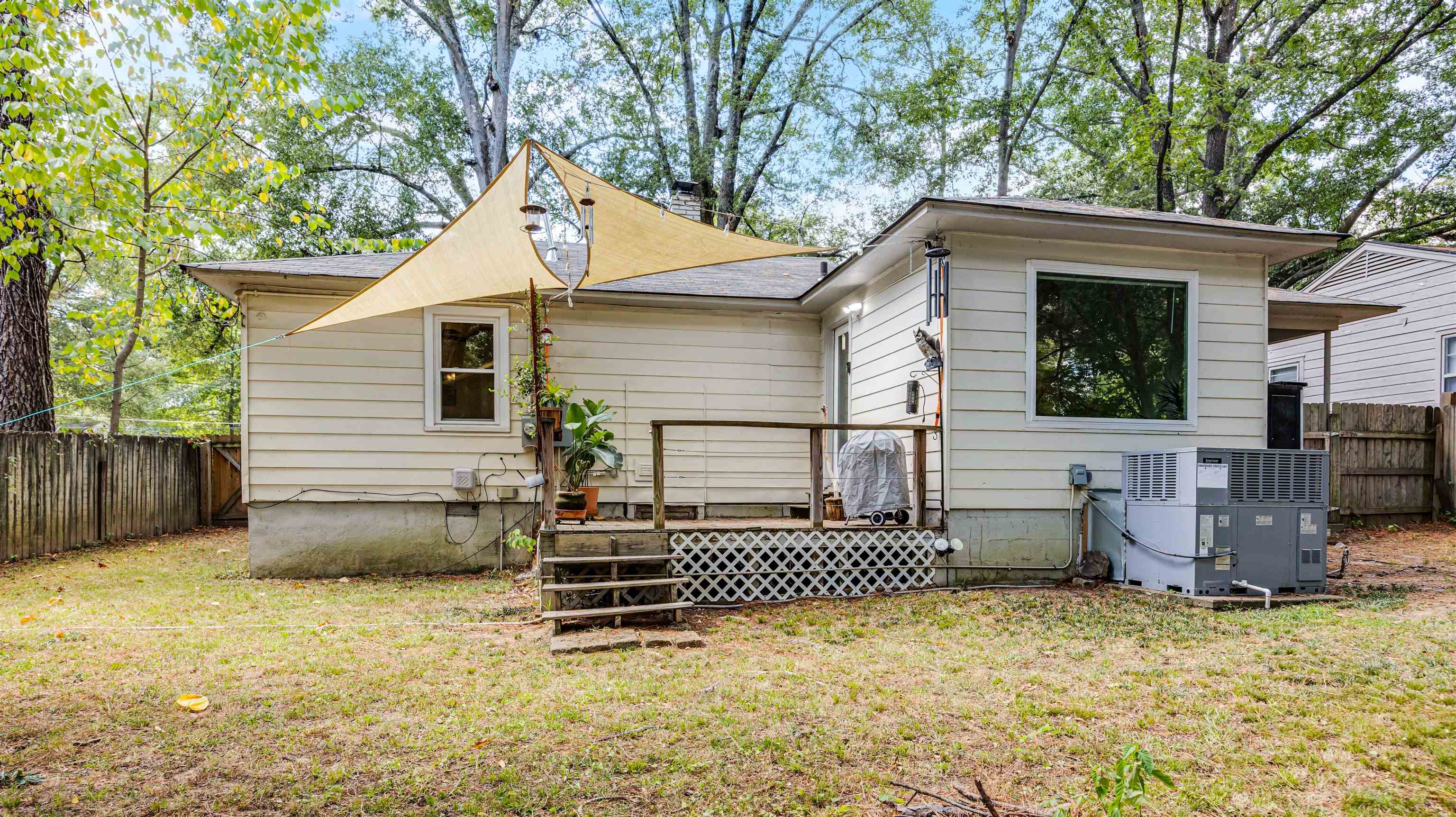 144 Sycamore Road Collierville, TN 38017 - Photo 11 of 11 a view of a chair and table in backyard
