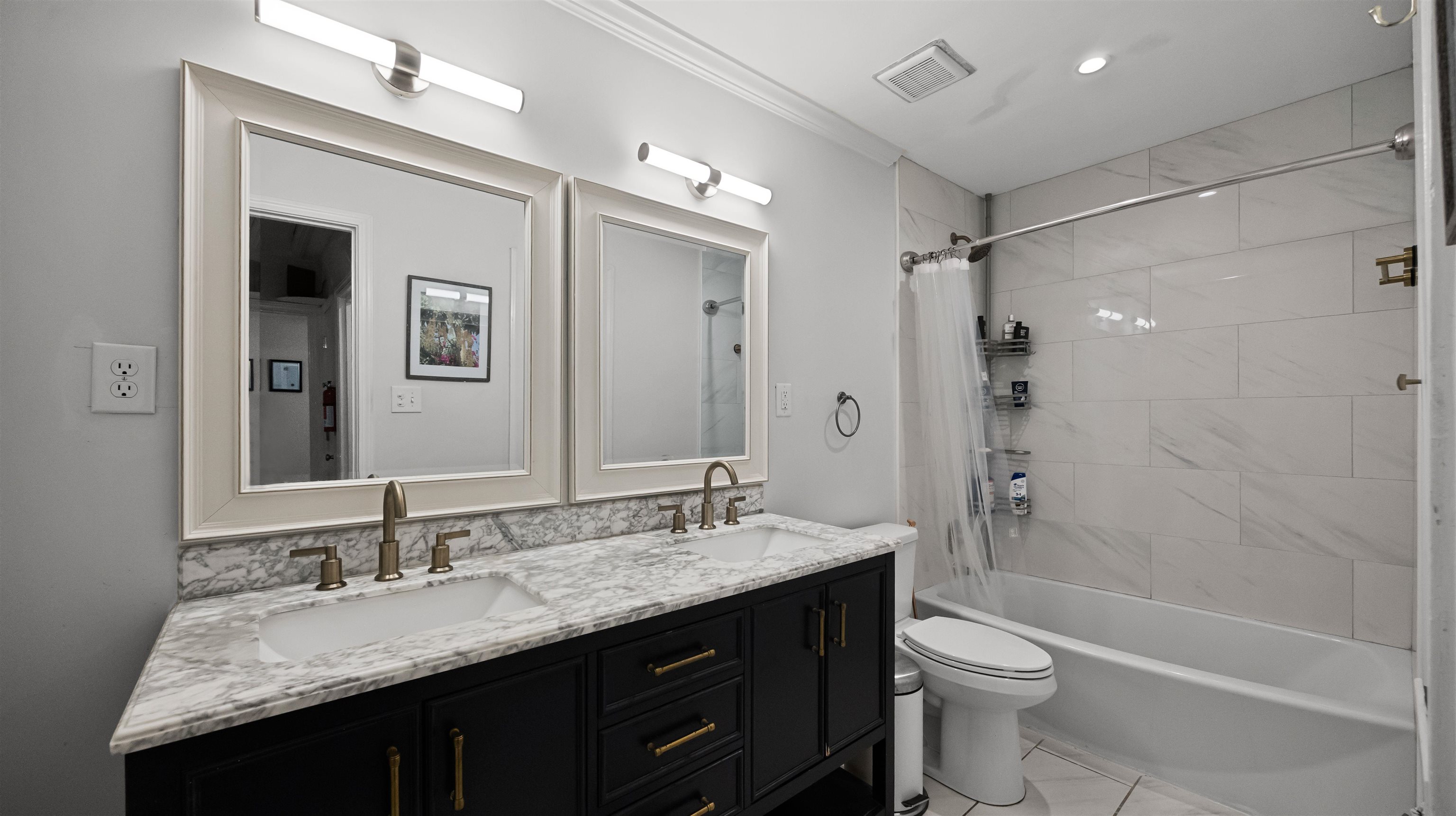 144 Sycamore Road Collierville, TN 38017 - Photo 5 of 11 a bathroom with a granite countertop sink toilet and shower